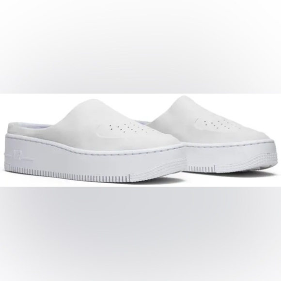 Nike Shoes - Nike light cream Mules with Perforated Design